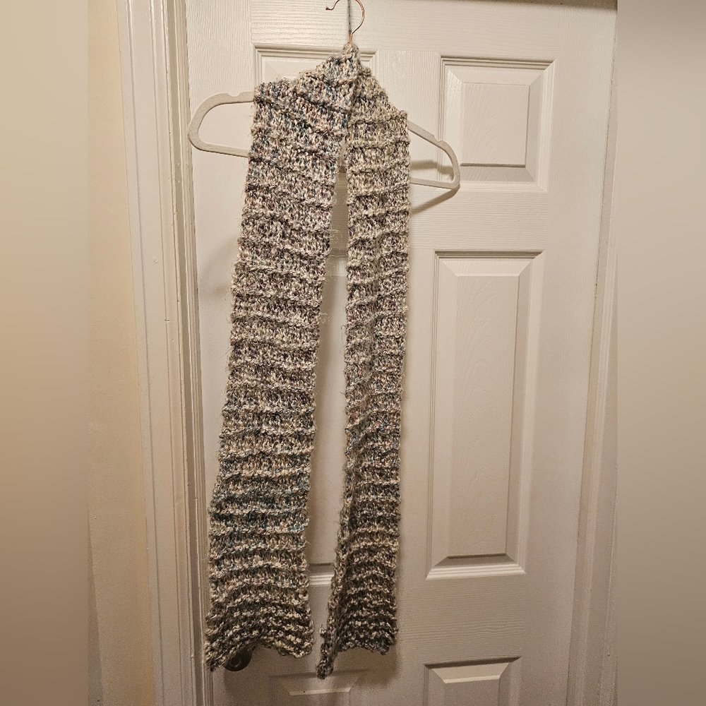 Tan scarf with a pop of blue